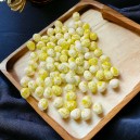 Mini jajka pastelowe żóty z białym nakrapiane 1,5x1,8 cm - 100 szt